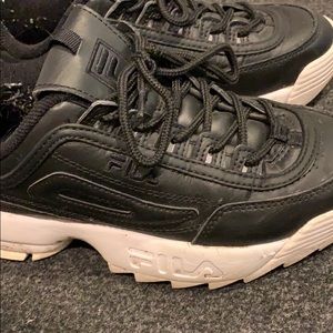 Black Fila disruptor sneakers